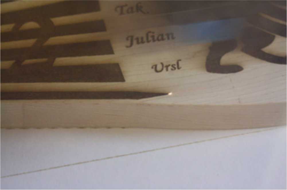 Laserbeschriftung eines Holzteils Laserbeschriftung eines Holzteils